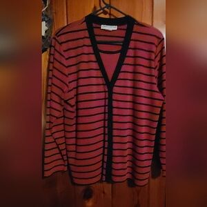 Long sleeved, blouse by Cathy Daniel's, size medium.